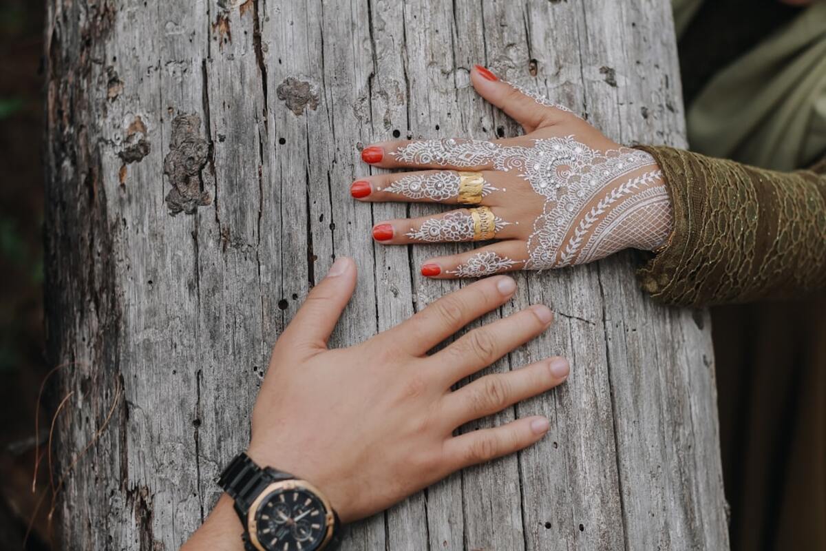 Short natural nails with a sheer milky builder gel overlay, glossy and smooth with a clean cuticle line and subtle apex.